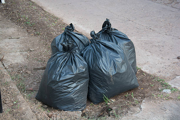 Plastic trash bags on outside street office