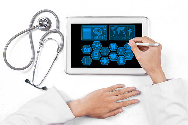 istock Medical doctor hands with tablet 534196441