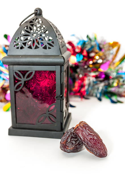Date fruits and arabic lantern. Ramadan Eid concept