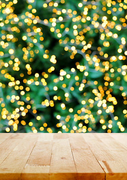 istock Wood table top on bokeh background from christmas tree 534196969