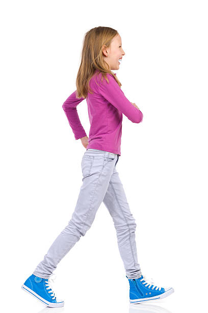 istock Happy girl walking 534198019