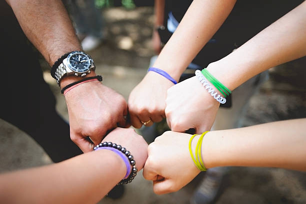 istock Different people put a hand in the center outdoor 534200322