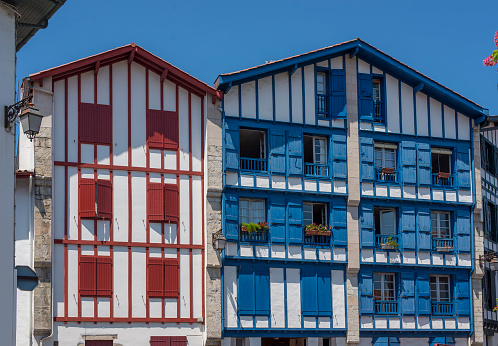 Typical buildings of Basque country in a street of Ciboure. Aquitaine, France.