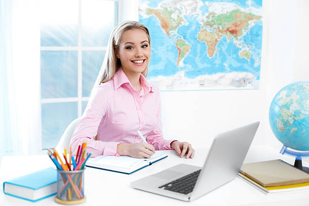 istock Female travel agent at office 534201444