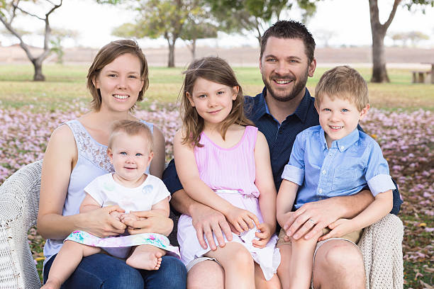istock Young happy family in park 534202038