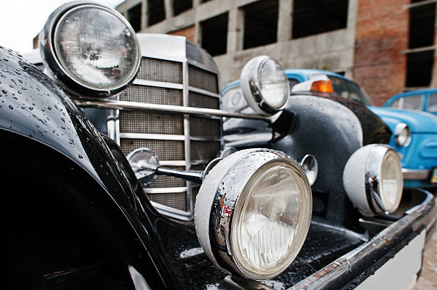 istock Old vintage car headlight close up. 534203386