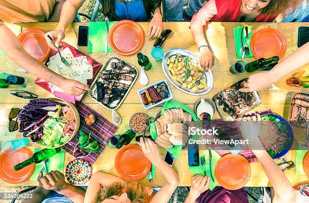 Top View Of Friend Hands Serving Food At Barbecue Party Stock Photo - Download Image Now