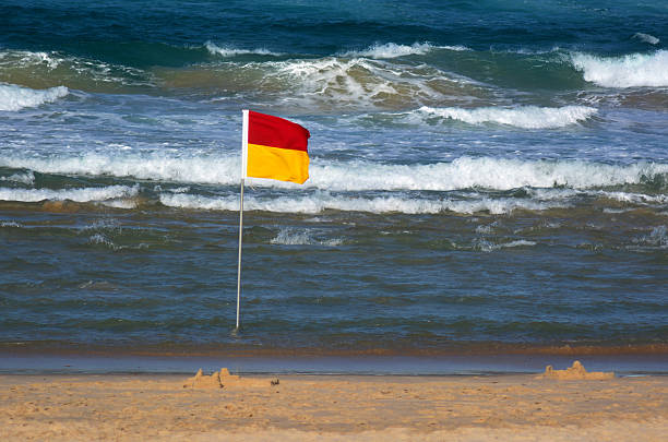 Color bunting flags on wind in summer sea camp.