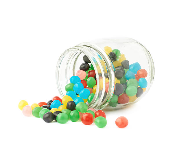 istock Candy ball sweets falling out of a jar 534209088