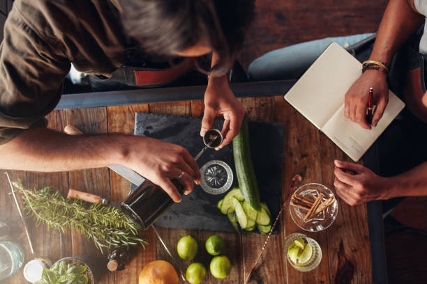 istock Two barmen creating new cocktail recipe 534211466