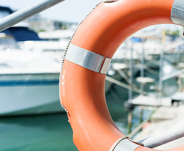 istock Life buoy hung on a railing in the port. 534215608