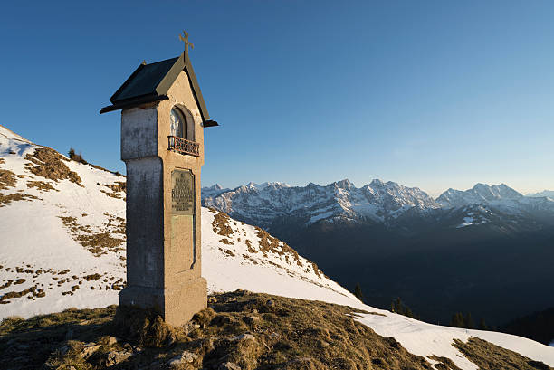 istock Wayside shrine in the European Alps at sunset 534216498