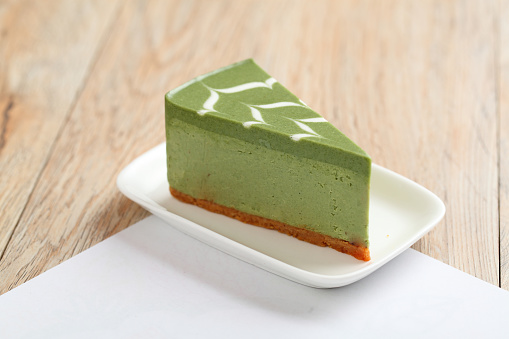 Single green tea cheese cake slice(with path).