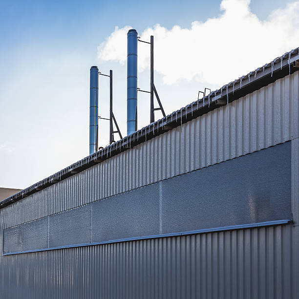 istock Wall of industrial building with pipes 534218133