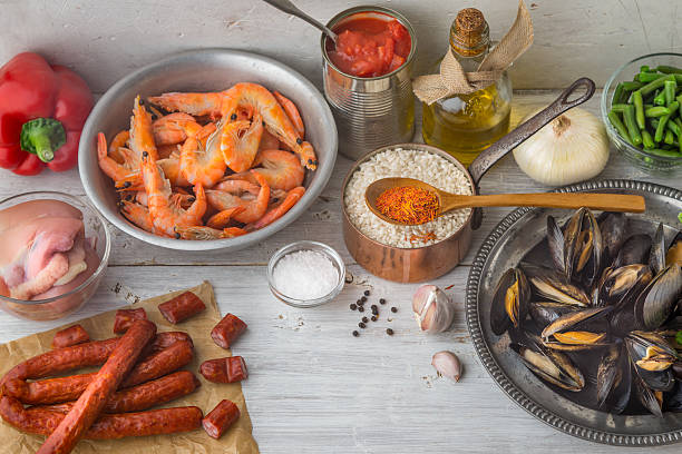 istock Ingredients for paella on the white scratched table 534218444