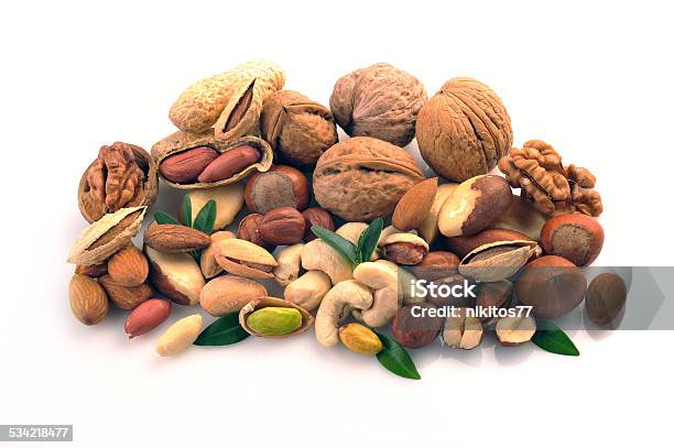 Set Of Nuts On A White Background Stock Photo - Download Image Now - 2015, Almond, Brazil Nut