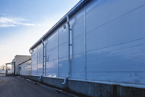 istock Wall of industrial building with pipes 534219077
