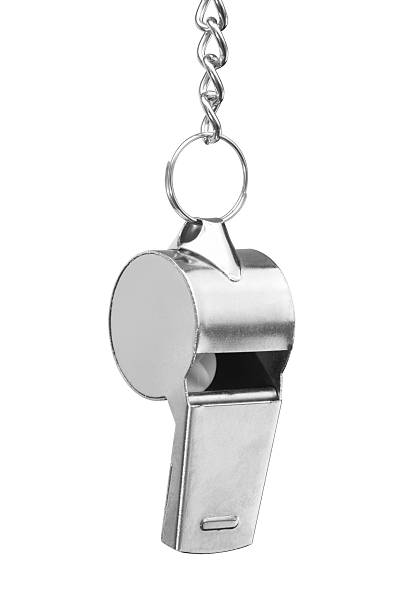 metal whistle Hanging metal whistle isolated on white whistle stock pictures, royalty-free photos & images