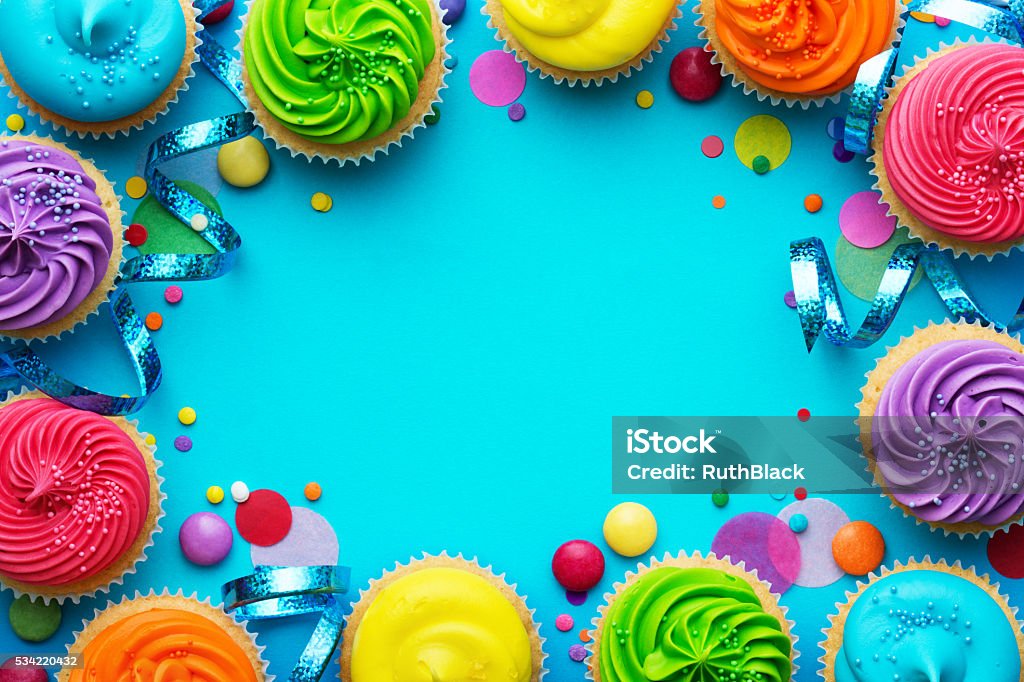 Party background Party background with cupcakes and confetti Birthday Stock Photo