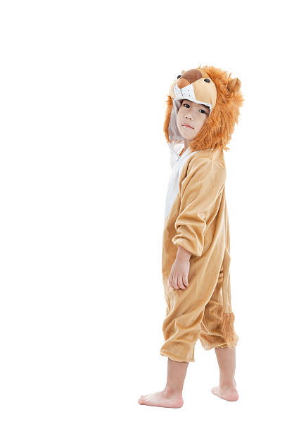 istock Cute little child dressed in lion suit 534221523