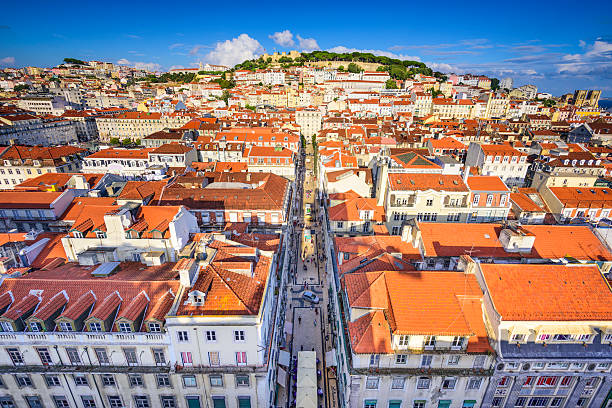 Lisbon, Portugal Cityscape Lisbon, Portugal city skyline over Santa Justa Rua. baixa stock pictures, royalty-free photos & images