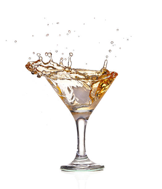 istock alcohol cocktail with splash of ice isolated on white 534221819