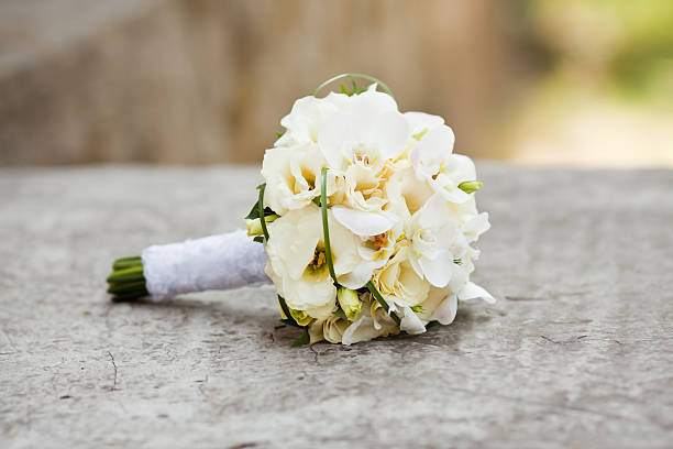 istock White and yellow wedding bouquet with roses 534221857