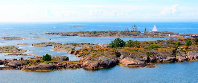 Aland archipelago with its tiny rocky islands. One of these is Kobba Klintar, an old pilot station on sea.