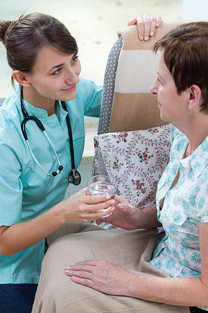 istock Taking care of older woman 534223981