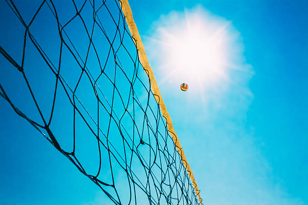 istock Volleyball Ball Over Net, Blue Sky 534225737