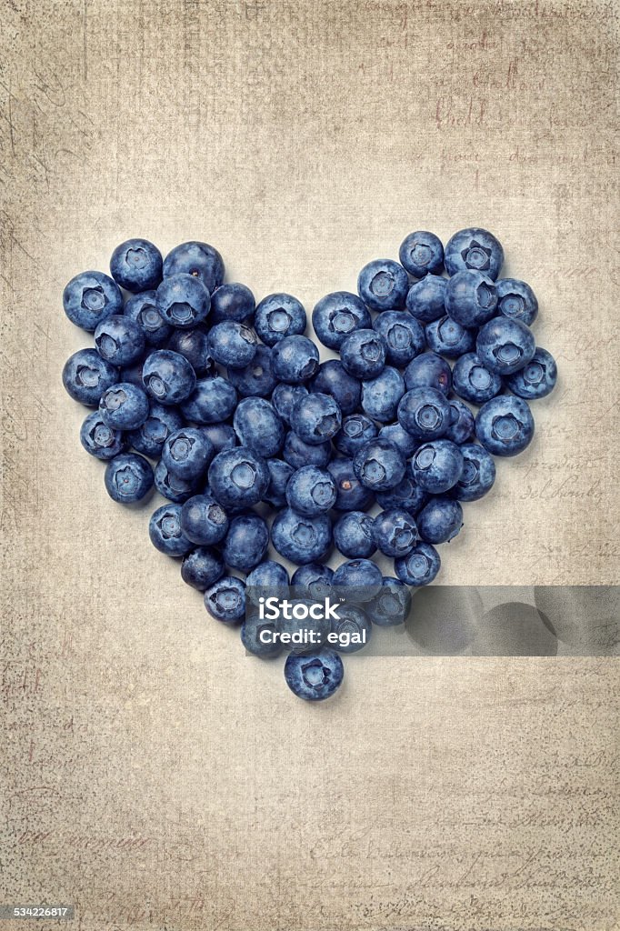 Heart from blackberries Heart from blackberries on a vintage background 2015 Stock Photo