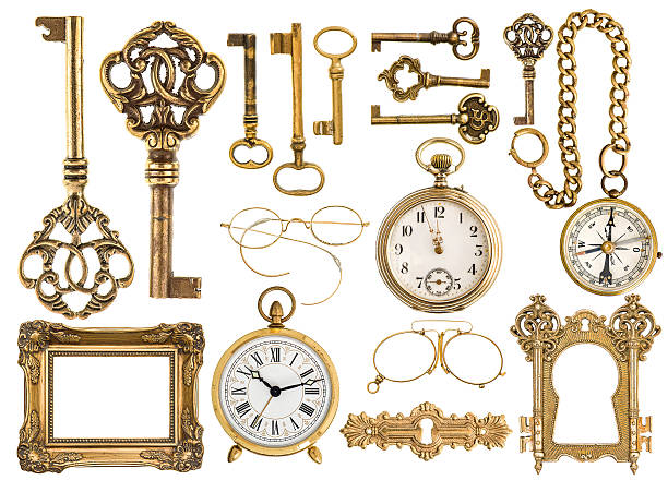istock golden antique accessories. baroque frame, vintage keys, clock 534227309