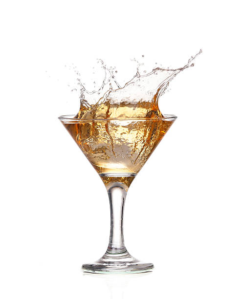 istock alcohol cocktail with splash of ice isolated on white 534264419