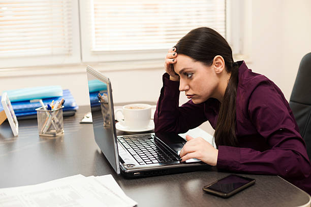 istock Depressed woman in the office 534264461