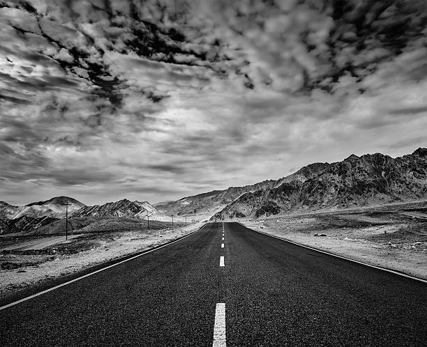 istock Road  in Himalayas with mountains 534265039