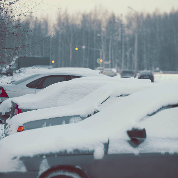 istock Winter cars covered snow on the parking 534270595