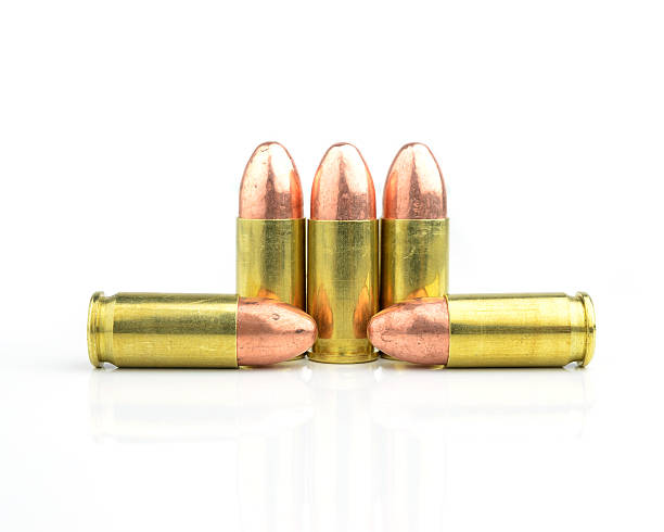 istock 9mm bullet for a gun isolated on white background. 534271811