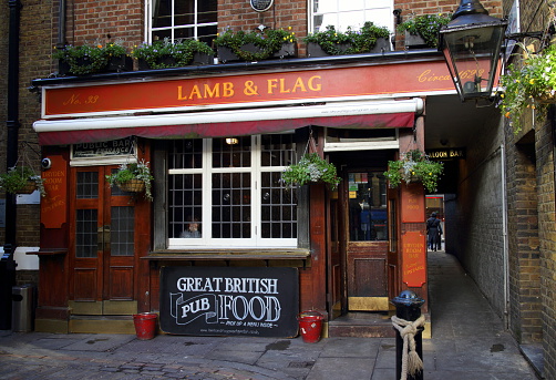 London, United Kingdom - January 24, 2015: Exterior of the Lamb & Flag Public House near Covent Garden, London. The pub acquired a reputation in the early 19th century for staging bare-knuckle prize fights. 