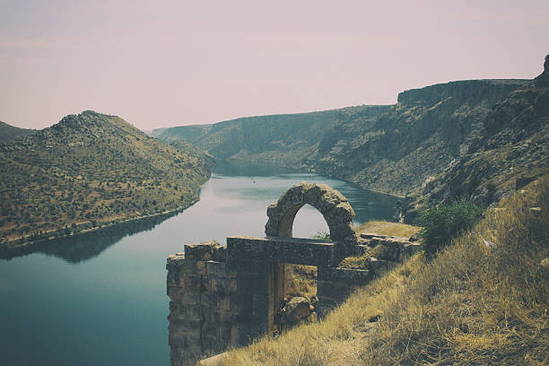Rumkale and Firat River Old ruins of a castle from 12th century on the Firat River in Halfeti, Gaziantep, Turkey rumkale stock pictures, royalty-free photos & images