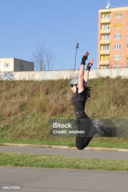 High Jump On Inline Skates Stock Photo - Download Image Now - Roller Skate, Roller Skating, Stunt