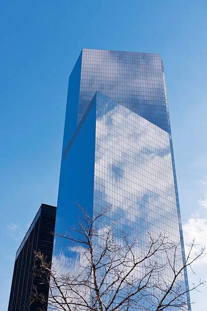 istock Skyscrapers from ground view with blue sky visible 534302955