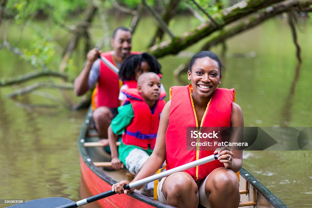 Canoeing African American family canoeing. 2015 Stock Photo