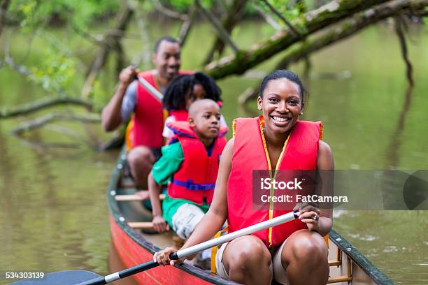 Canoeing Stock Photo - Download Image Now - 2015, Adult, African Ethnicity