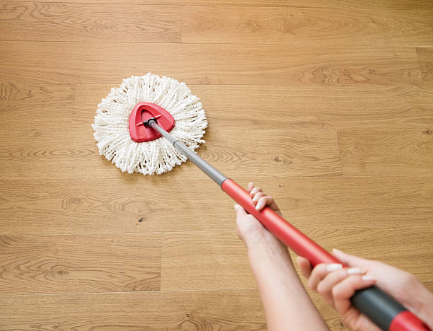 istock Swab cleaning the Wooden Plank Parquet 534305664