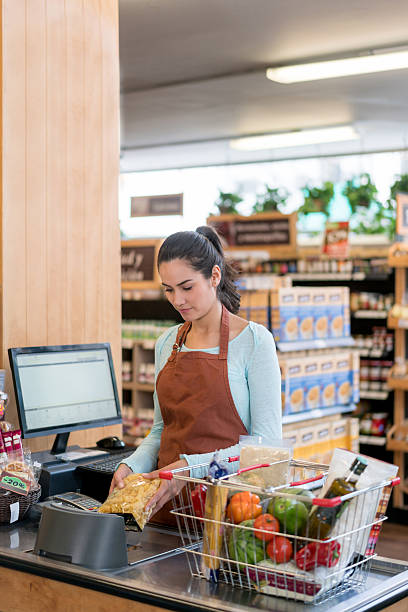 istock Cashier working at the grocery store 534306058
