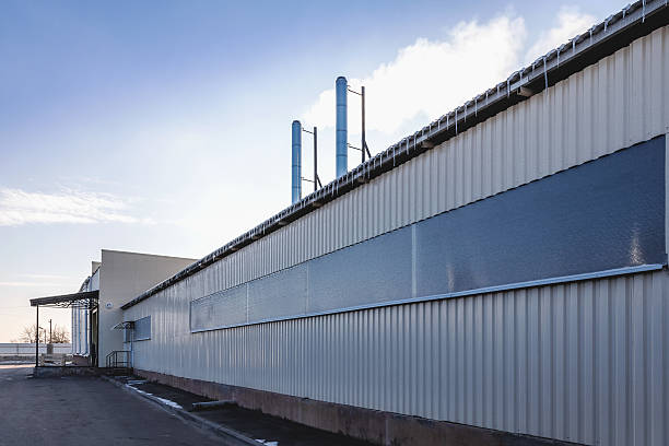 istock Wall of industrial building with pipes 534306697
