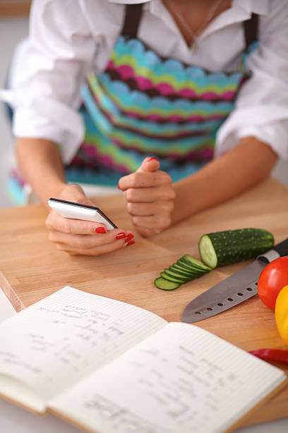 istock Woman preparing salad in the kitchen 534306979