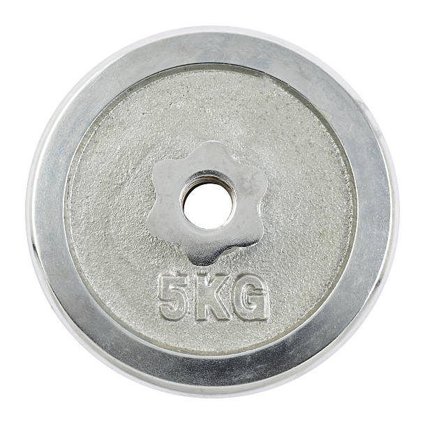 istock Metal barbell plate isolated 534311060