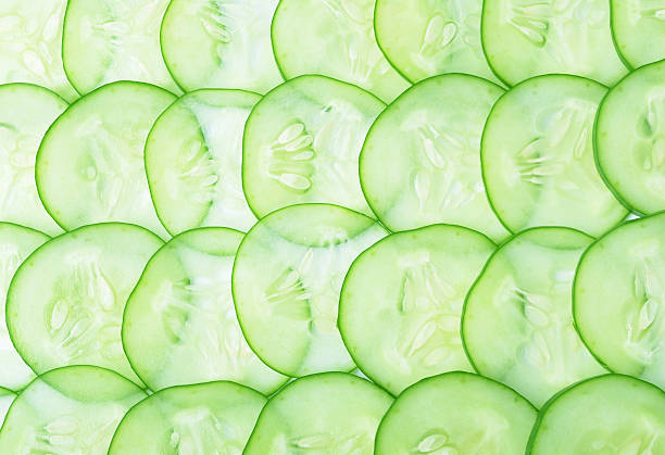 istock Cucumber and slices on  background. 534311347