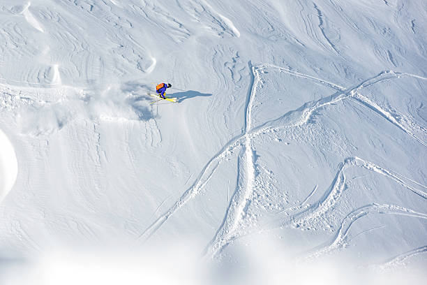 istock Skier skiing off-piste on a beatiful mountain slope 534314682